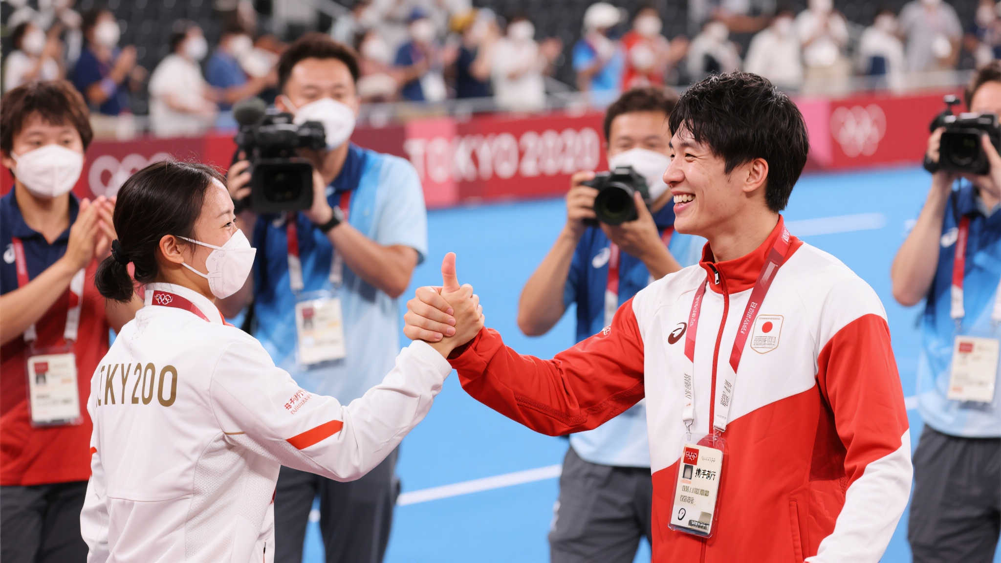 齐心协力 传承奥运精神